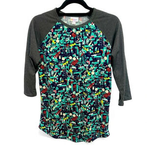 LuLaRoe Randy baseball style T-shirt with grey sleeves and 80s pattern size S